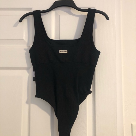 New black body suit perfect for the summertime. Size medium - Picture 13 of 13